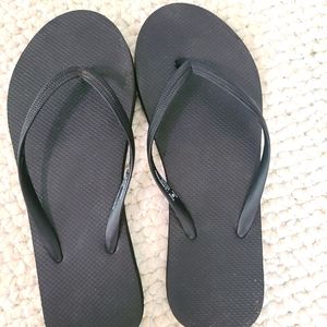 Black flip flops